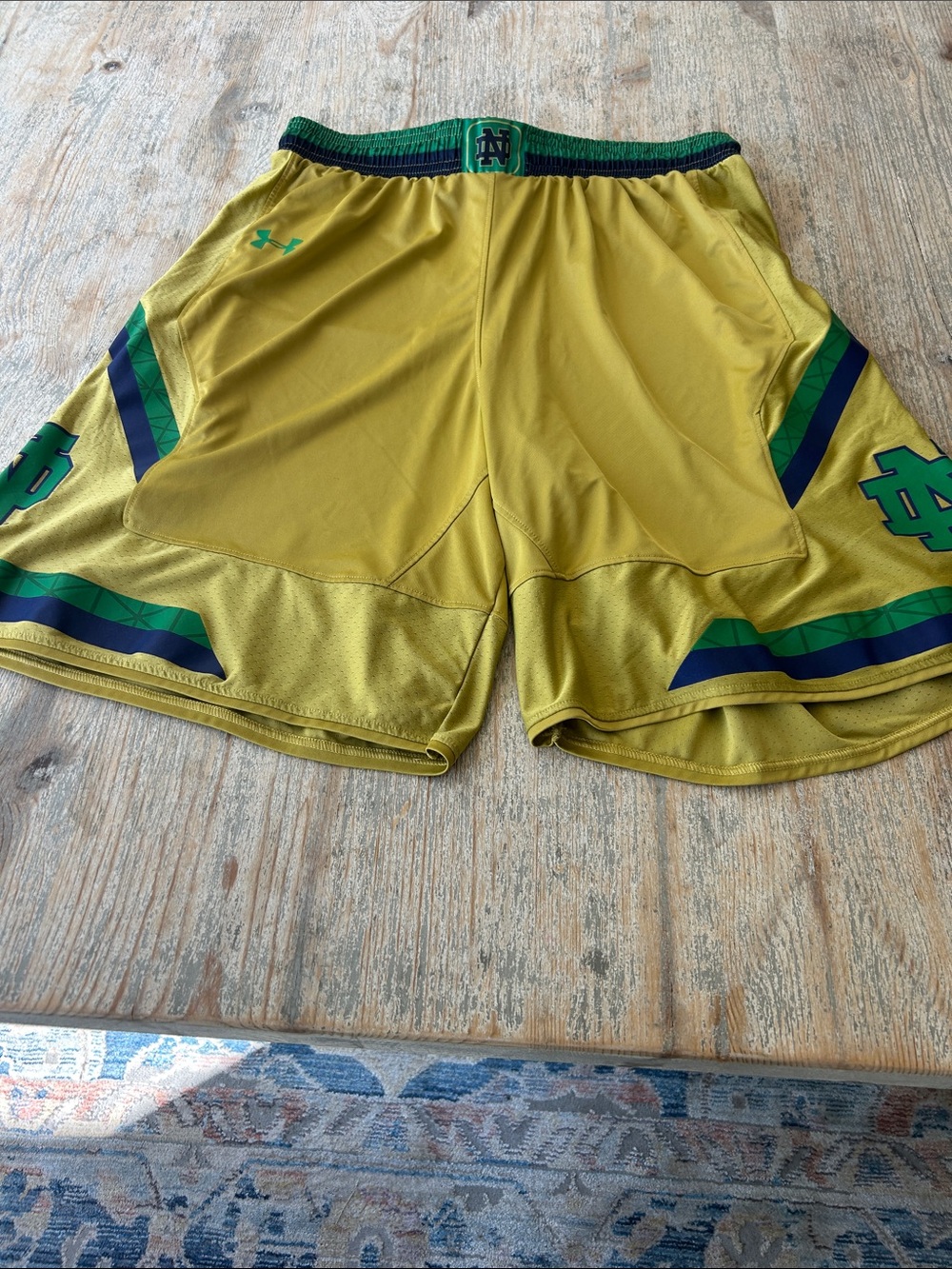 Under Armour Men’s Gold Athletic Shorts with Green & Navy Trim